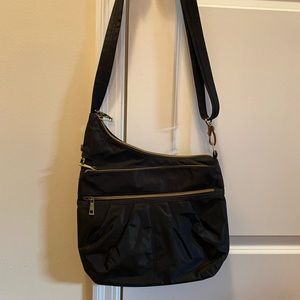 Travelon Black Slash-proof Travel Crossbody handbag with lots of pockets